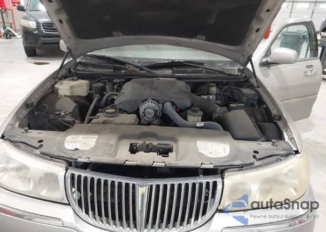 1999 Lincoln Town Car Signature z USA, uszkodzony, nr VIN 1LNHM82W4XY663084